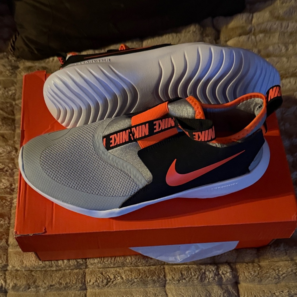 Nike Kids Gray and Black Sneakers with Orange Accents